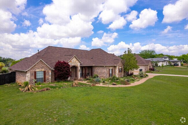 Traditional one-story brick homes with manicured lawns line the streets of Westlake.