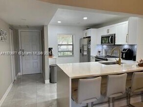 Building Photo - 8360 Boca Glades Blvd E