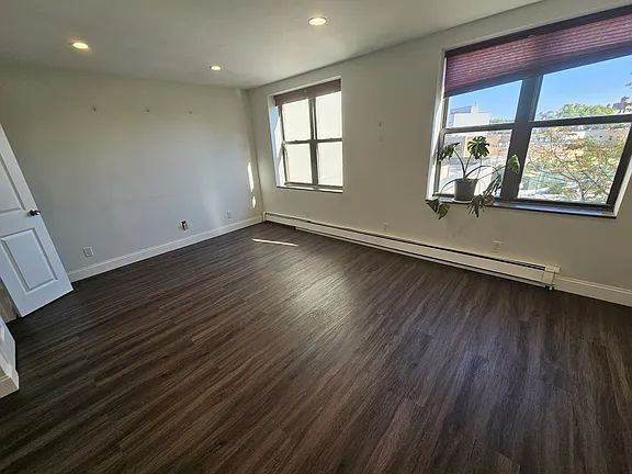 Building Photo - Discover stunning city views from your bedroom