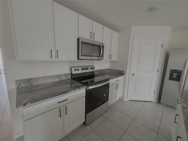 Building Photo - 8940 SW 50th Ter