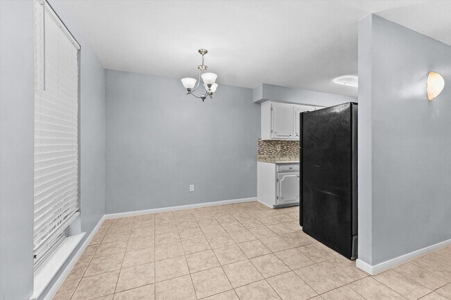 Photo - Bright & Updated 2-Bedroom Townhouse in Quiet Community with Pool Access!