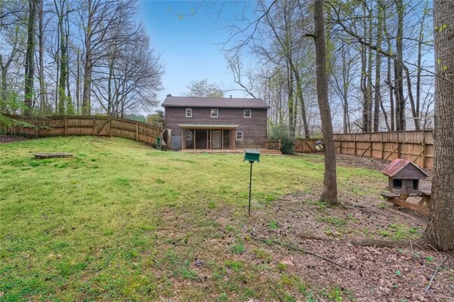 Building Photo - 4680 Whispering Woods Dr