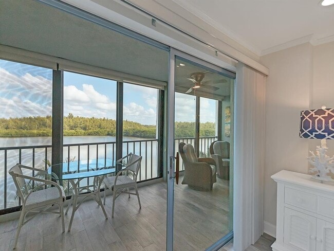 Building Photo - 9397 Midnight Pass Rd