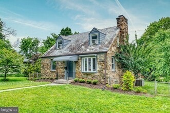 Building Photo - 6233 Woodcrest Ave