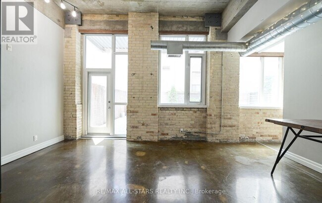 Building Photo - 201-201 Carlaw Ave