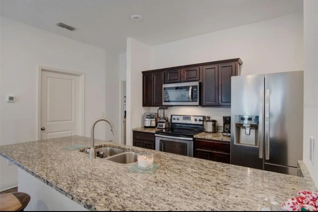 Foto principal - 901 Orchid Grove Blvd