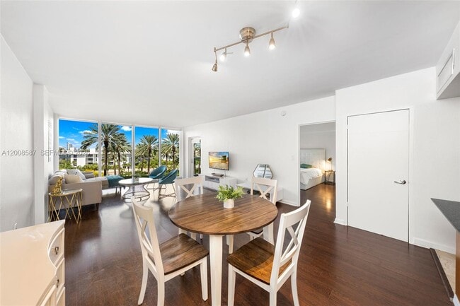 Building Photo - 10275 Collins Ave
