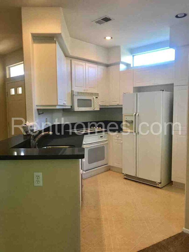 Building Photo - 10728-242 Sabre Hill Drive