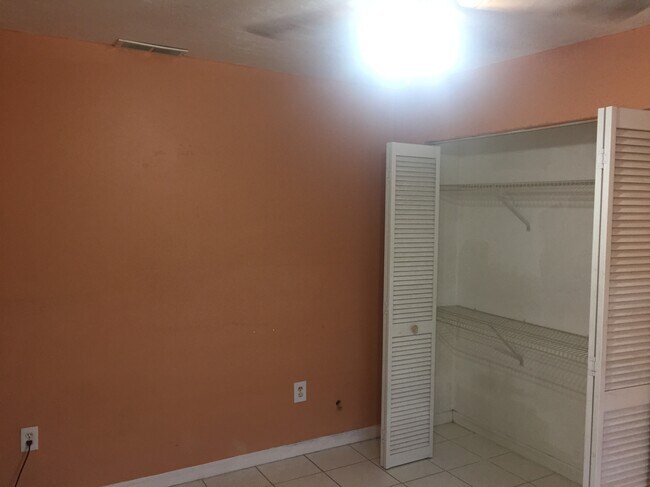 Main room. Overhead fan. Large closet. - 1300 Jeronimo Drive