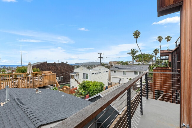 Wrap around patio with views to enjoy morning coffee and the ocean breeze. - 4638 Del Monte Ave