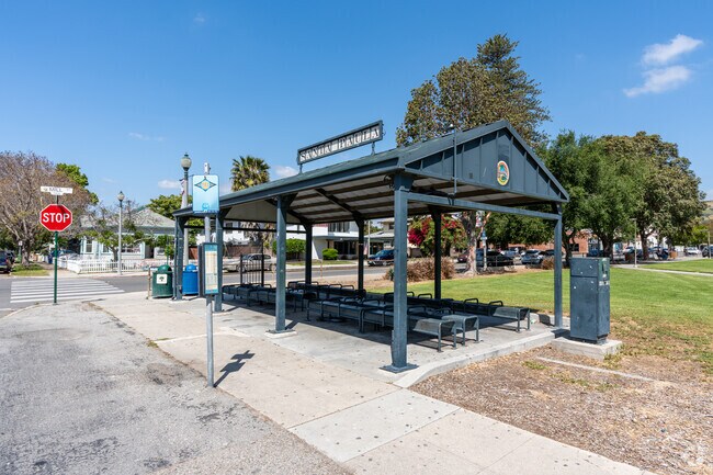 A bus stop with shade and benches in Santa Paula.