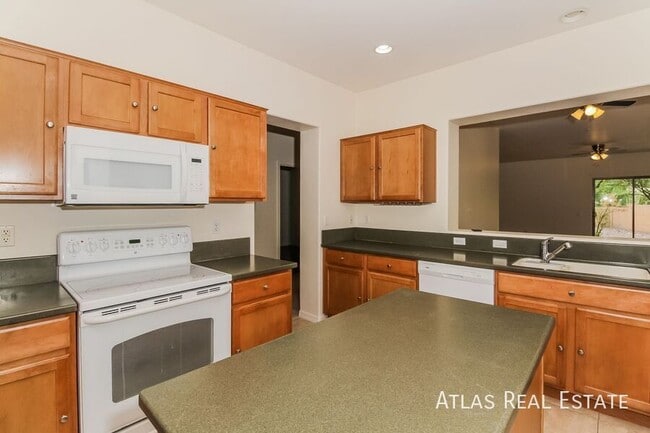 Building Photo - 9665 N Deimos Dr