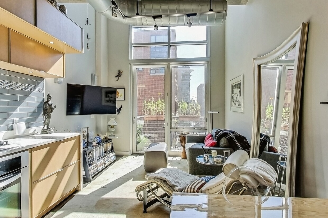 Two-Level Loft Condo at The Metropole - Two-Level Loft Condo at The Metropole