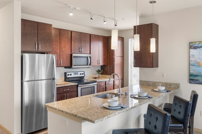 Building Photo - 1505 Apartments + Townhomes