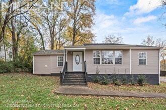 Building Photo - 702 Woodlawn Dr