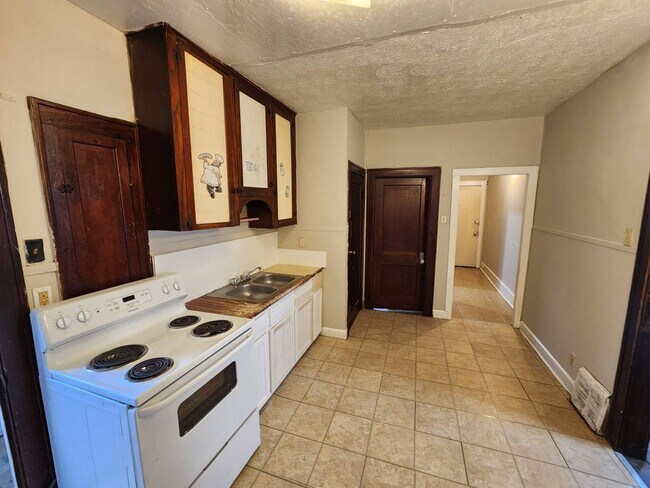 Foto del edificio - Charming 4-Bedroom Property in Prime Location (SECTION 8 VOUCHERS ACCEPTED)