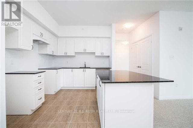 Photo du bâtiment - 306 Essa Rd