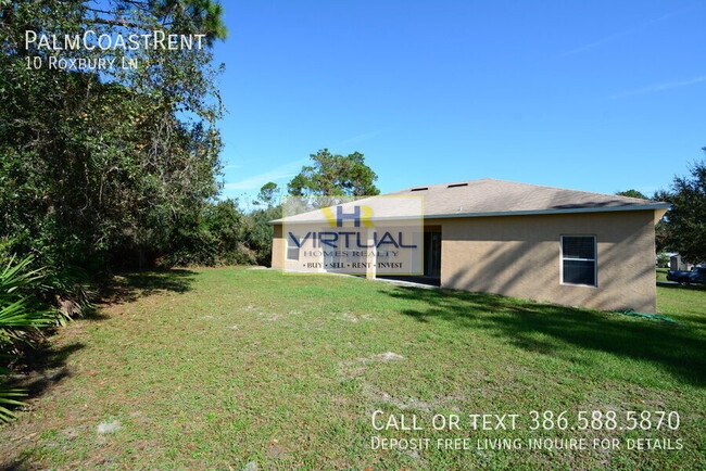 Building Photo - "Spacious 4-Bed Oasis in Palm Coast with 2...