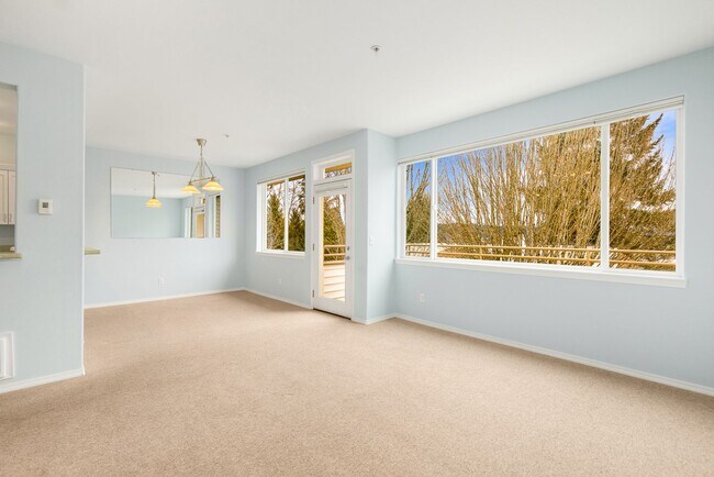 Building Photo - Spacious 2-Bed, 2-Bath Condo with Large Ga...