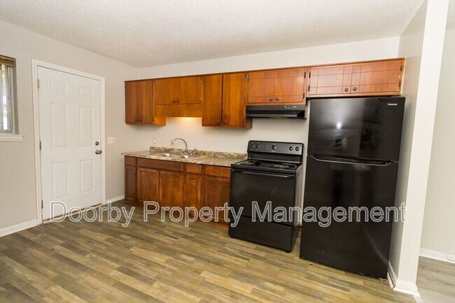 Foto del edificio - 6413 Basswood Ln
