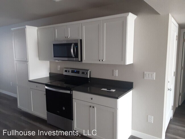 Foto del edificio - 8403-8459 W Hampden Ave