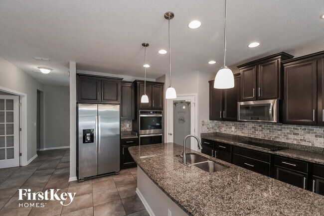 Building Photo - 4550 Plantation Oaks Blvd