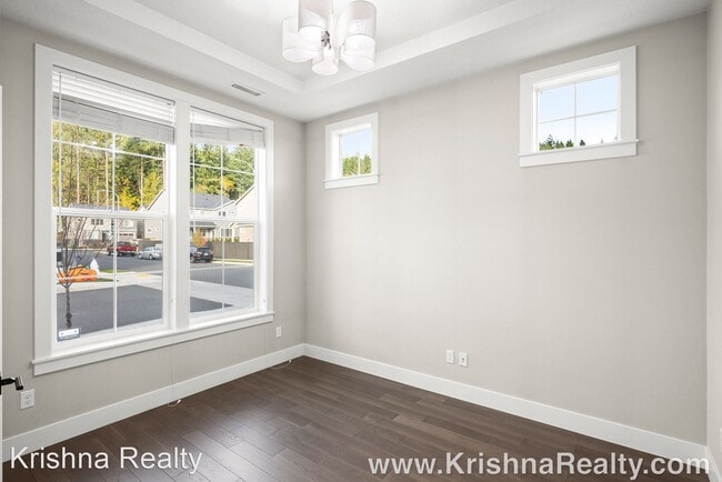 Building Photo - 4 br, 3 bath House - 11822 NW Thelin Ln