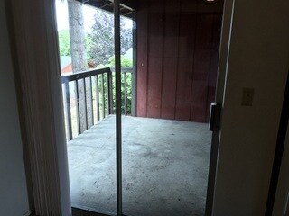 Building Photo - Upstairs unit in four plex w/ garage