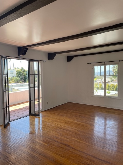 Living Room opening up to Balcony - 3205 Berkeley Ave