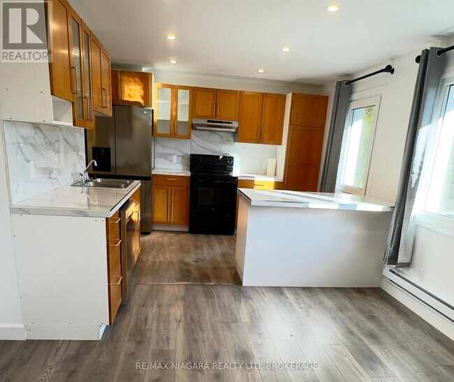 Photo du bâtiment - 4992 McRae St