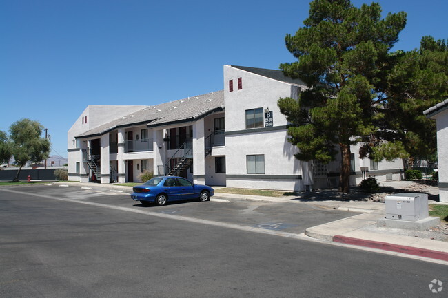 Building Photo - The Maverick and Hidden Village Apartments