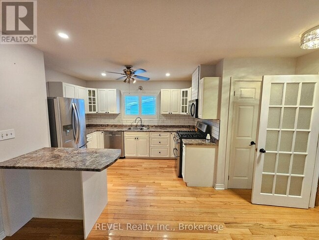 Building Photo - 5566 Highland Ave