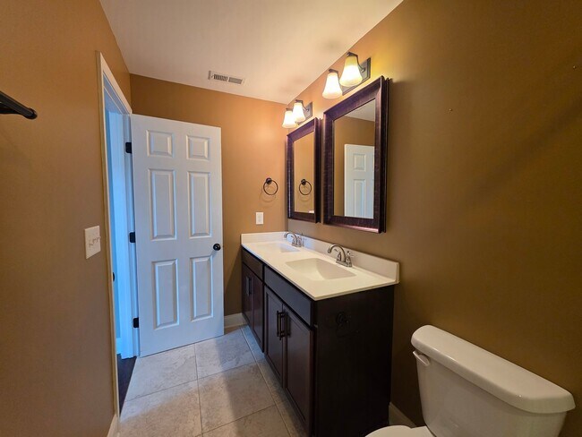 Building Photo - For Lease  End-Unit 3-Bedroom Townhome wit...