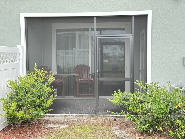 Private screened-in back porch - 588 Running Woods St