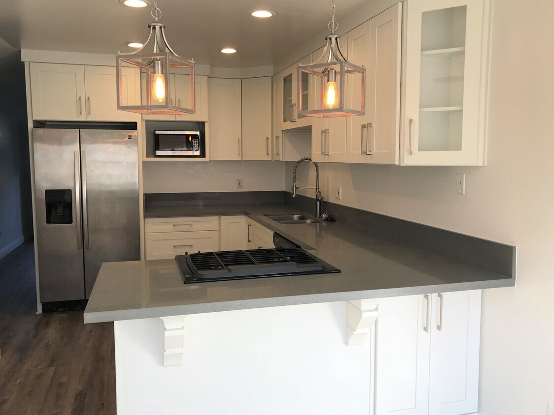 Renovated Kitchen w/ Shaker Cabinets & Quartz Counters - 4923 Pearce Dr
