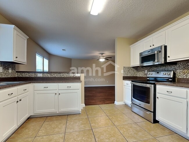 Foto del edificio - 10098 Chariden Dr