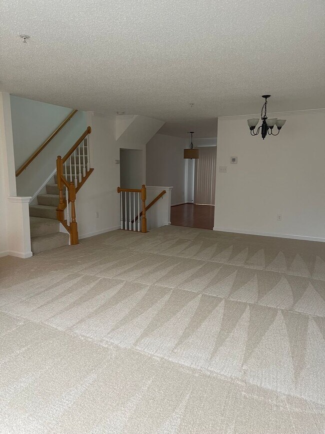 Building Photo - Brick front townhouse with all fresh inter...
