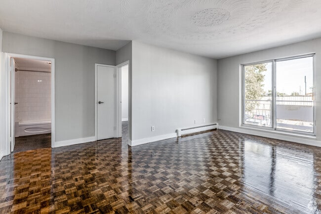 1BR, 1BA - 565SF - Living Room - 16 Champlain Avenue