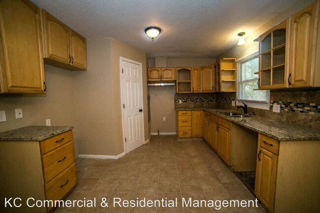 Foto del edificio - 4 br, 3 bath House - 15801 E 42nd Place