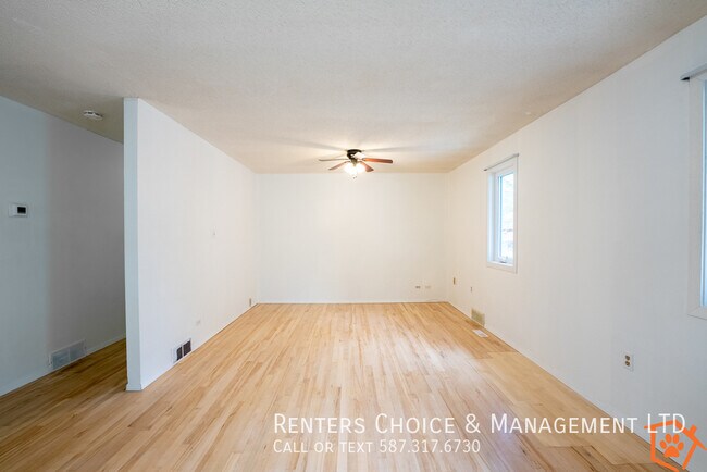 Building Photo - Main Floor Suite with No Yard Care Duties,...