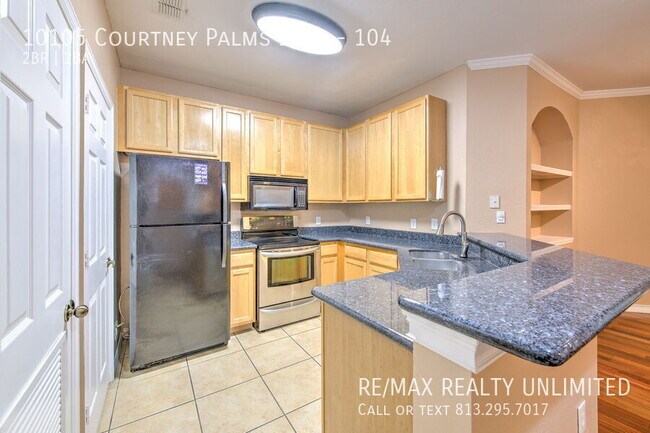 Foto del edificio - 10105 Courtney Palms Blvd