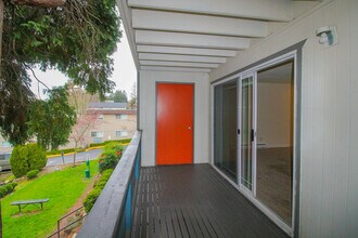 Enjoy fresh air and city views from your balcony patio at Foster Creek in Tukwila. - Foster Creek