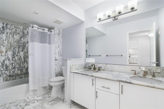Building Photo - 9801 Collins Ave