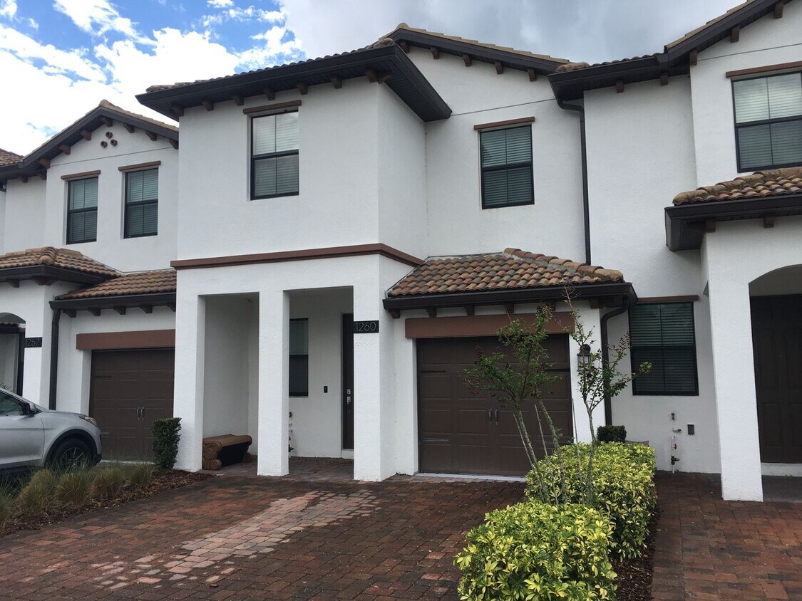 Primary Photo - BEAUTIFUL CHAMPIONSGATE HOME WITH LAKE VIEW