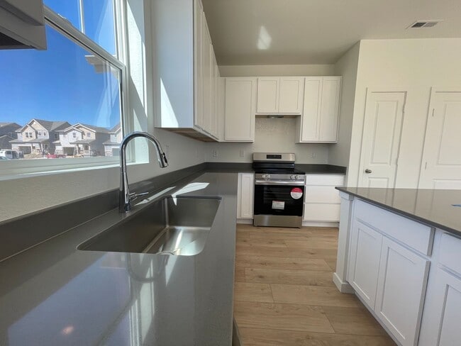 Building Photo - One year old home on corner lot!! Your nex...