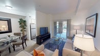 Located at 5306 Case Ave in Pleasanton, California, this single-story residence offers a well-organized and comfortable layout. The living room serves as the heart of the home, featuring plush carpeting, a sliding glass door that floods the space with natural light and opens to an outdoor patio with views of the surrounding greenery. Beam detailing on the ceiling adds architectural character, while the open feel makes the room welcoming and functional.

The kitchen is efficiently designed with a galley-style layout, featuring stainless steel appliances including a refrigerator, range, microwave, and dishwasher. Light wood cabinetry provides ample storage, complemented by a window that brings in additional natural light. Wood-look flooring runs throughout the kitchen, adding a warm, durable finish.

The bedroom is a calm retreat with soft carpeting, a large window framing outdoor tree views, and a mirrored sliding closet that enhances the sense of space. The room offers comfortable proportions suitable for a full furniture arrangement.

The bathroom is clean and well-appointed, featuring wood-look flooring, white cabinetry with a single vanity, a large mirror, and crisp white walls that give the space a bright, tidy appearance. Overall, this residence combines practical design with comfortable finishes throughout.