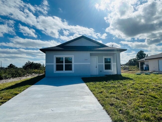Brand-New 2BR/2BA Home with Lanai on Oversized Lot – Desirable SW Lehigh Acres - Brand-New 2BR/2BA Home with Lanai on Oversized Lot – Desirable SW Lehigh Acres