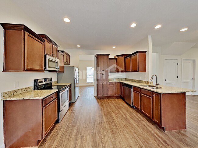 Foto del edificio - 6457 Sunnywood Dr