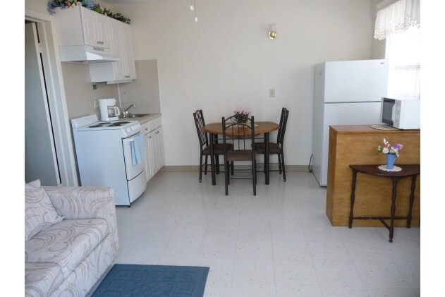 Foto del edificio - Sandy Cove Apartments & RV Park