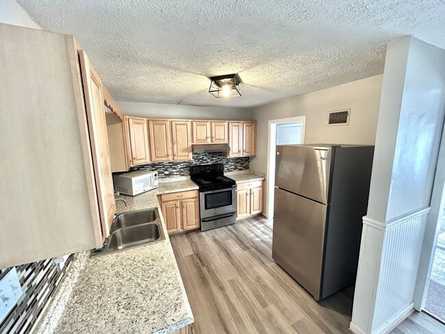 Foto del edificio - 110 E Gray St